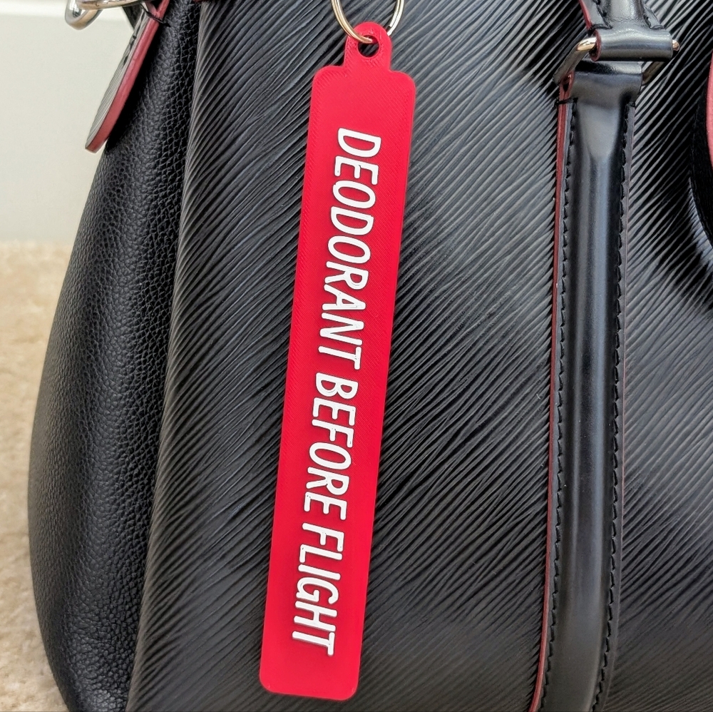 Funny "Deodorant Before Flight" Travel-Inspired Keychain with White Text